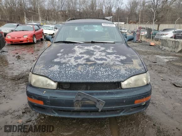 1994 Toyota Camry z VIN 4T1SK12W5RU365849, wystawiony jako Copart lot #44363565 z przebiegiem 226 124 mil mil oraz Szkoda całkowita • Salvage title. Historia ofert i sprzedaży dostępna na DreamBid. Obrazek 5.