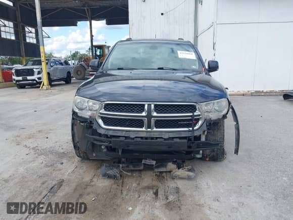2013 Dodge Durango Crew with VIN 1C4RDJDG6DC690060, listed as a IAAI auction lot 43134968 with 160,833 mi miles and . Bid and sale history available at DreamBid. Image 6.