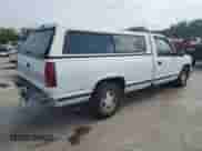 1997 Chevrolet Silverado 1500 with VIN 1GCEC14RXVZ124680, listed as a Copart auction lot 80872365 with 158,021 mi miles and Salvage title. Bid and sale history available at DreamBid. Image 3.
