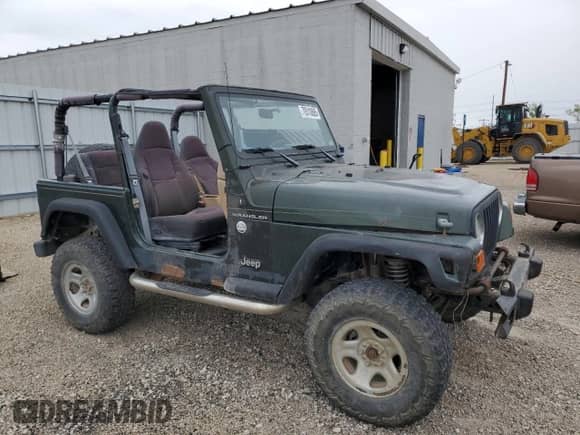 1998 Jeep Wrangler SE z VIN 1J4FY29P1WP763752, wystawiony jako Copart lot #70510885 z przebiegiem 228 480 mil mil oraz Szkoda całkowita • Salvage title. Historia ofert i sprzedaży dostępna na DreamBid. Obrazek 4.