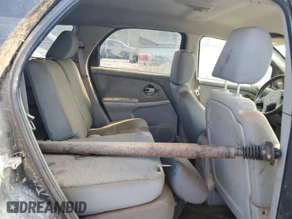 2005 Chevrolet Equinox LS z VIN 2CNDL23F456186124, wystawiony jako Copart lot #69178434 z przebiegiem Nie podano mil oraz Szkoda całkowita • Salvage title. Historia ofert i sprzedaży dostępna na DreamBid. Obrazek 11.