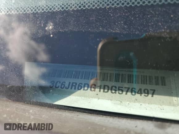 2013 Ram 1500 Tradesman with VIN 3C6JR6DG1DG576497, listed as a Copart auction lot 62755035 with 122,499 mi miles and Clean title. Bid and sale history available at DreamBid. Image 12.