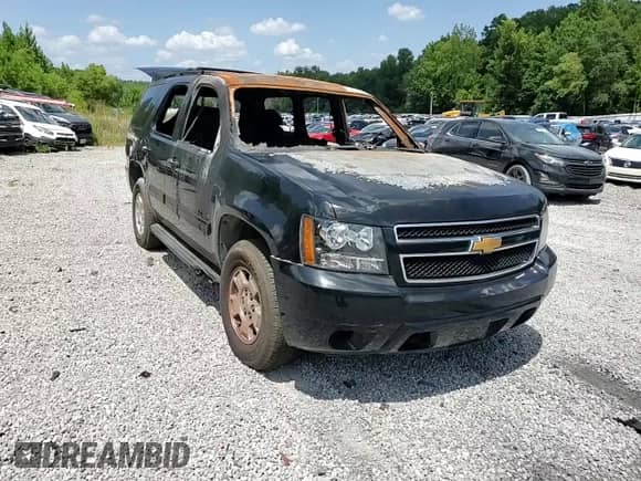 2014 Chevrolet Tahoe LS с VIN 1GNSCAE09ER141612, выставлен на аукционе Copart как лот 64678565 с пробегом Не указан миль и Списание • Salvage title. История ставок и продаж доступна на DreamBid. Изображение 13.