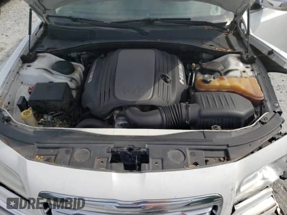 2014 Chrysler 300 C z VIN 2C3CCAET6EH355310, wystawiony jako Copart lot #70996205 z przebiegiem 172 952 mil mil oraz Szkoda całkowita • Salvage title. Historia ofert i sprzedaży dostępna na DreamBid. Obrazek 11.