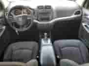 2015 Dodge Journey SE with VIN 3C4PDCAB2FT600003, listed as a Copart auction lot 68659695 with 168,396 mi miles and Salvage title. Bid and sale history available at DreamBid. Image 8.