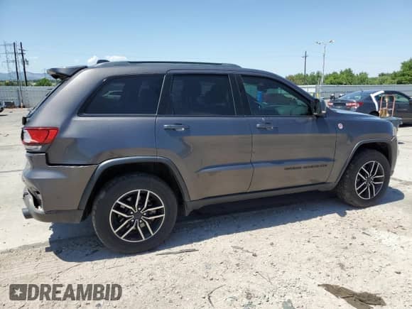 2020 Jeep Grand Cherokee Trailhawk with VIN 1C4RJFLT8LC177606, listed as a Copart auction lot 61678385 with 127,421 mi miles and Salvage title. Bid and sale history available at DreamBid. Image 3.
