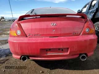 2003 Hyundai Tiburon GT с VIN KMHHN65FX3U078623, выставлен на аукционе Copart как лот 42570475 с пробегом 196 426 миль миль и Списание • Salvage title. История ставок и продаж доступна на DreamBid. Изображение 6.