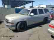 2004 Chevrolet Tahoe LS with VIN 1GNEC13T74R151824, listed as a Copart auction lot 70682005 with 204,620 mi miles and Salvage title. Bid and sale history available at DreamBid. Image 1.