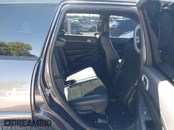 2020 Jeep Grand Cherokee Laredo E with VIN 1C4RJEAGXLC244965, listed as a IAAI auction lot 43026734 with 70,553 mi miles and . Bid and sale history available at DreamBid. Image 8.