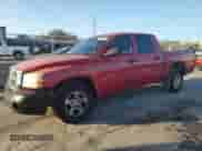 2006 Dodge Dakota z VIN 1D5HE48NX6S503428, wystawiony jako Copart lot #79024054 z przebiegiem 152 956 mil mil oraz Szkoda całkowita • Salvage title. Historia ofert i sprzedaży dostępna na DreamBid. Obrazek 1.