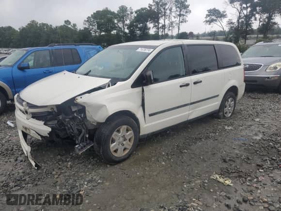 2010 Dodge Grand Caravan Cargo with VIN 2D4CN1AEXAR377301, listed as a Copart auction lot 71476774 with 125,421 mi miles and Salvage title. Bid and sale history available at DreamBid. Image 1.