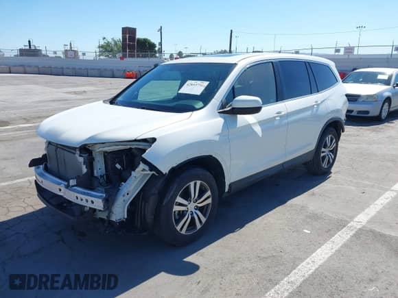 2018 Honda Pilot EX-L with VIN 5FNYF5H52JB026830, listed as a IAAI auction lot 42853756 with 15,305 mi miles and . Bid and sale history available at DreamBid. Image 2.