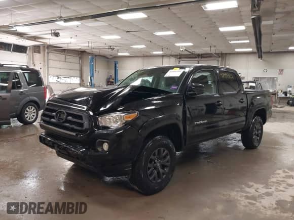 2023 Toyota Tacoma SR z VIN 3TYCZ5AN8PT141565, wystawiony jako IAAI lot #42491352 z przebiegiem 17 966 mil mil oraz . Historia ofert i sprzedaży dostępna na DreamBid. Obrazek 17.