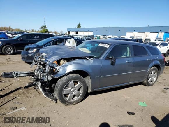 2006 Dodge Magnum R/T with VIN 2D4GZ572X6H537393, listed as a Copart auction lot 76594084 with 81,078 mi miles and Salvage title. Bid and sale history available at DreamBid. Image 1.