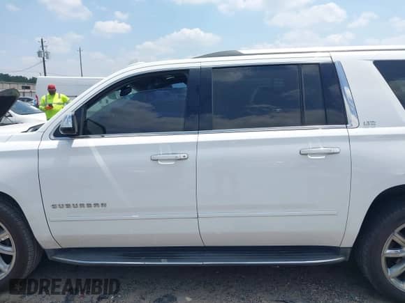 2016 Chevrolet Suburban LTZ with VIN 1GNSKJKC4GR215460, listed as a IAAI auction lot 42333991 with 183,700 mi miles and . Bid and sale history available at DreamBid. Image 14.