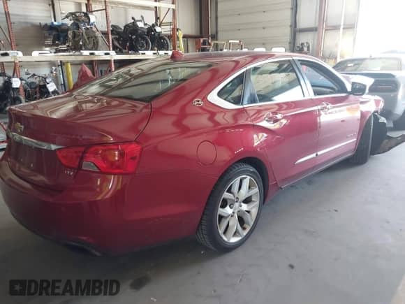 2014 Chevrolet Impala LTZ with VIN 1G1145SL1EU115373, listed as a IAAI auction lot 42570890 with 103,225 mi miles and . Bid and sale history available at DreamBid. Image 4.