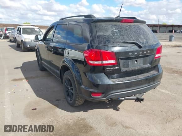 2019 Dodge Journey SE with VIN 3C4PDCBG4KT846023, listed as a IAAI auction lot 43196525 with 88,413 mi miles and . Bid and sale history available at DreamBid. Image 3.