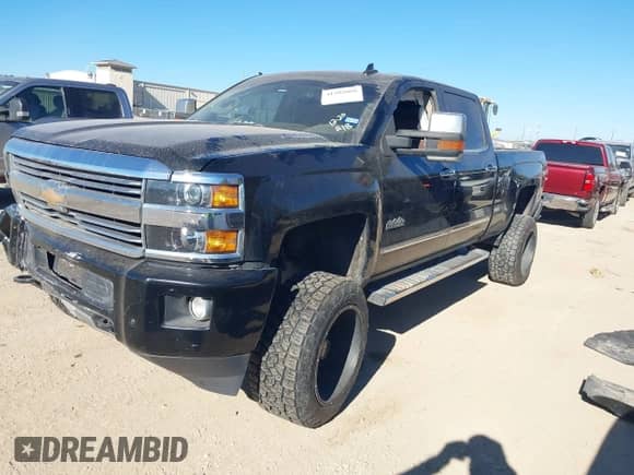 2016 Chevrolet Silverado 2500HD High Country z VIN 1GC1KXE89GF283916, wystawiony jako IAAI lot #41202088 z przebiegiem 182 756 mil mil oraz . Historia ofert i sprzedaży dostępna na DreamBid. Obrazek 2.