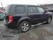 2013 Honda Pilot EX-L with VIN 5FNYF4H7XDB047974, listed as a Copart auction lot 83999755 with 136,449 mi miles and Salvage title. Bid and sale history available at DreamBid. Image 3.