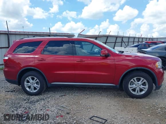 2011 Dodge Durango Crew with VIN 1D4RD4GG8BC634392, listed as a IAAI auction lot 42552266 with 166,166 mi miles and . Bid and sale history available at DreamBid. Image 13.
