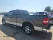 2007 Ford F-150 XL with VIN 1FTPX12V67KB02975, listed as a Copart auction lot 80307185 with 129,442 mi miles and Salvage title. Bid and sale history available at DreamBid. Image 2.