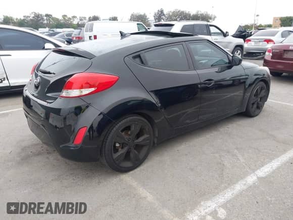 2015 Hyundai Veloster with VIN KMHTC6AD4FU240867, listed as a IAAI auction lot 42887164 with 94,620 mi miles and . Bid and sale history available at DreamBid. Image 4.