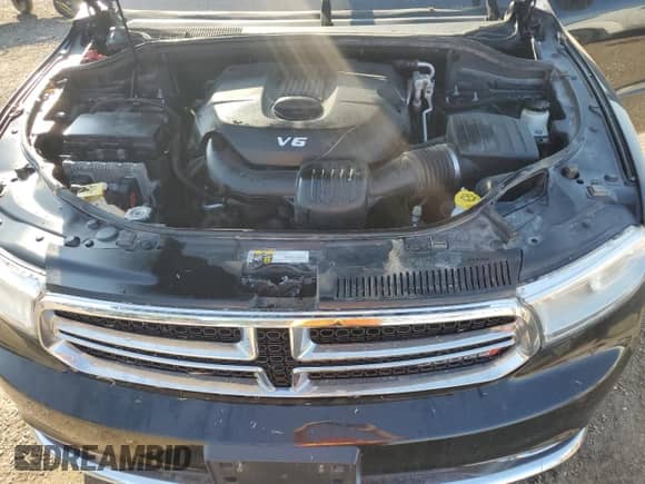 2015 Dodge Durango Limited with VIN 1C4RDJDG7FC870215, listed as a Copart auction lot 68575895 with 185,274 mi miles and Salvage title. Bid and sale history available at DreamBid. Image 12.
