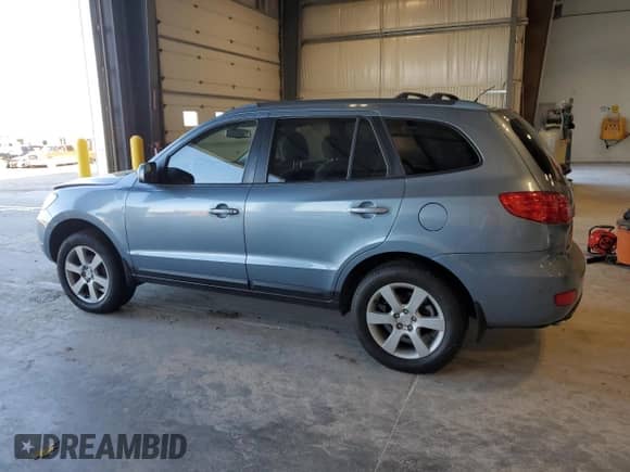 2009 Hyundai Santa Fe Limited with VIN 5NMSH13E79H237421, listed as a Copart auction lot 84976705 with 126,121 mi miles and Salvage title. Bid and sale history available at DreamBid. Image 2.