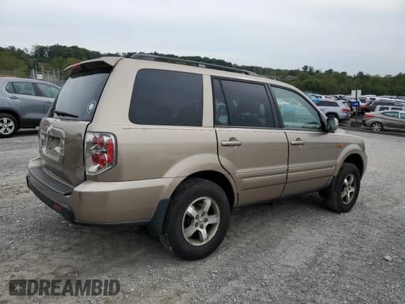 2006 Honda Pilot EX-L with VIN 5FNYF18786B001819, listed as a Copart auction lot 84269155 with 211,278 mi miles and Salvage title. Bid and sale history available at DreamBid. Image 3.