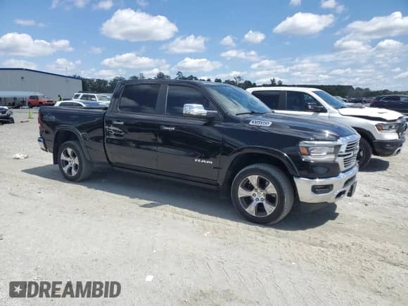 2019 Ram 1500 Laramie с VIN 1C6SRFRT7KN542739, выставлен на аукционе Copart как лот 71394425 с пробегом 137 961 миль миль и Списание • Salvage title. История ставок и продаж доступна на DreamBid. Изображение 4.