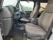 2004 Jeep Wrangler Sport z VIN 1J4FA49SX4P764853, wystawiony jako Copart lot #67621195 z przebiegiem 183 544 mil mil oraz Szkoda całkowita • Salvage title. Historia ofert i sprzedaży dostępna na DreamBid. Obrazek 7.