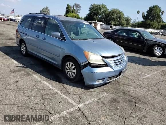 2008 Honda Odyssey EX z VIN 5FNRL38408B026747, wystawiony jako Copart lot #80564745 z przebiegiem 130 209 mil mil oraz Szkoda całkowita • Salvage title. Historia ofert i sprzedaży dostępna na DreamBid. Obrazek 14.