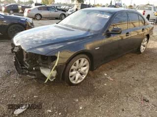 2003 BMW 7 Series 745i with VIN WBAGL63483DP65989, listed as a Copart auction lot 82057064 with 60,735 mi miles and Salvage title. Bid and sale history available at DreamBid. Image 1.