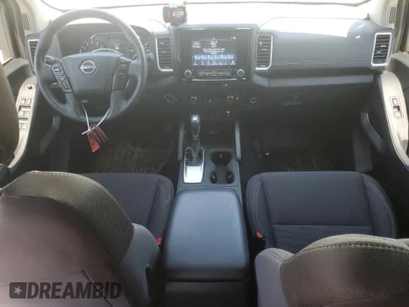 2023 Nissan Frontier SV with VIN 1N6ED1FK1PN665928, listed as a Copart auction lot 52036625 with 23,760 mi miles and Salvage title. Bid and sale history available at DreamBid. Image 8.