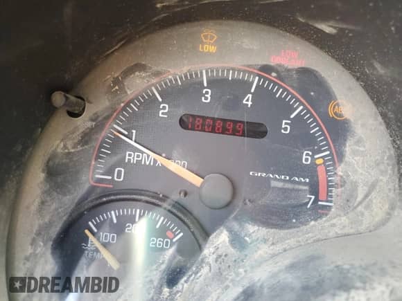 2001 Pontiac Grand Am SE1 with VIN 1G2NF52T31M547738, listed as a Copart auction lot 57442525 with 180,899 mi miles and Salvage title. Bid and sale history available at DreamBid. Image 9.