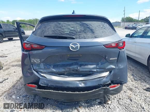 2022 Mazda CX-5 S Preferred z VIN JM3KFBCM1N0625605, wystawiony jako IAAI lot #42862055 z przebiegiem 34 472 mil mil oraz . Historia ofert i sprzedaży dostępna na DreamBid. Obrazek 16.