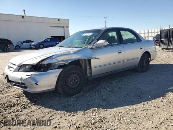 2002 Honda Accord LX with VIN 3HGCG66552G704399, listed as a Copart auction lot 82387785 with 233,345 mi miles and Salvage title. Bid and sale history available at DreamBid. Image 1.