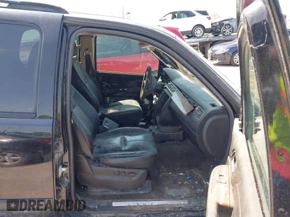 2007 Chevrolet Tahoe LTZ z VIN 1GNFK13077R331449, wystawiony jako IAAI lot #42848077 z przebiegiem Nie podano mil oraz . Historia ofert i sprzedaży dostępna na DreamBid. Obrazek 5.