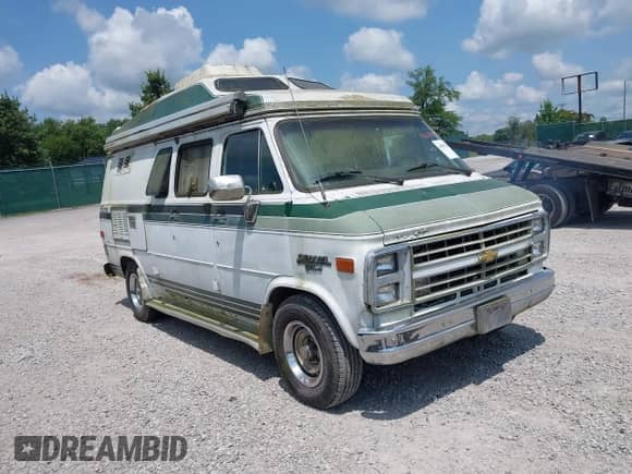1990 Chevrolet Chevy Van with VIN 1GBEG25KXL7110285, listed as a IAAI auction lot 42875782 with 235,828 mi miles and . Bid and sale history available at DreamBid. Image 1.