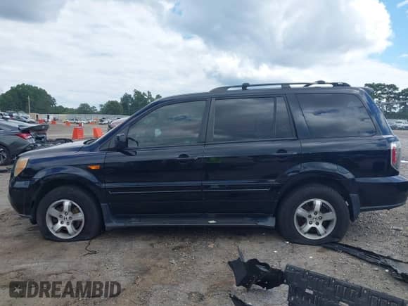 2006 Honda Pilot EX-L z VIN 5FNYF18536B025377, wystawiony jako IAAI lot #42739941 z przebiegiem 362 896 mil mil oraz . Historia ofert i sprzedaży dostępna na DreamBid. Obrazek 14.