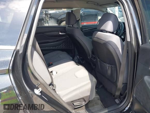 2021 Hyundai Santa Fe SE with VIN 5NMS14AJ0MH332918, listed as a IAAI auction lot 42365534 with 58,720 mi miles and . Bid and sale history available at DreamBid. Image 8.