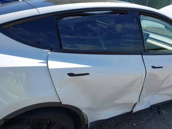 2023 Tesla Model Y Long Range with VIN 7SAYGDEE9PA033911, listed as a IAAI auction lot 43202182 with 35,938 mi miles and . Bid and sale history available at DreamBid. Image 6.