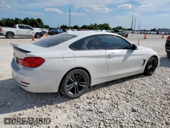 2015 BMW 4 Series 428i с VIN WBA3N3C58FK234890, выставлен на аукционе Copart как лот 65902975 с пробегом 115 422 миль миль и Списание • Salvage title. История ставок и продаж доступна на DreamBid. Изображение 3.