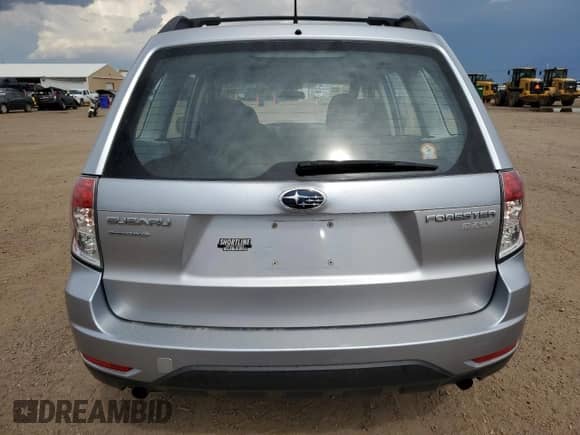 2013 Subaru Forester X z VIN JF2SHABC6DG404501, wystawiony jako Copart lot #64898635 z przebiegiem 137 175 mil mil oraz Szkoda całkowita • Salvage title. Historia ofert i sprzedaży dostępna na DreamBid. Obrazek 6.