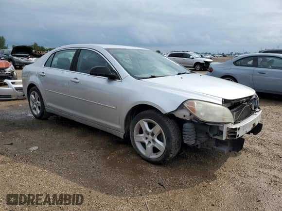 2010 Chevrolet Malibu 1LS with VIN 1G1ZB5EB5AF247546, listed as a Copart auction lot 71197135 with 137,602 mi miles and Salvage title. Bid and sale history available at DreamBid. Image 4.