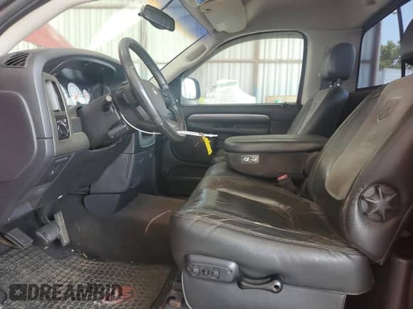 2004 Dodge 1500 SLT z VIN 1D7HA16D44J142244, wystawiony jako Copart lot #63097305 z przebiegiem 184 460 mil mil oraz Szkoda całkowita • Salvage title. Historia ofert i sprzedaży dostępna na DreamBid. Obrazek 7.