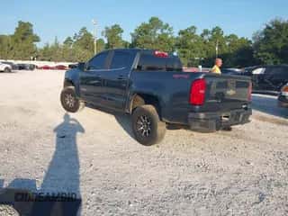 2019 Chevrolet Colorado 4WD LT z VIN 1GCGTCEN6K1143625, wystawiony jako IAAI lot #43593852 z przebiegiem 149 238 mil mil oraz . Historia ofert i sprzedaży dostępna na DreamBid. Obrazek 3.