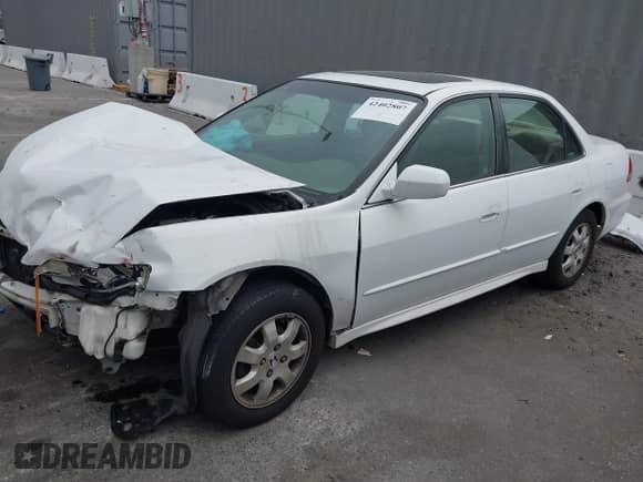 2002 Honda Accord EX with VIN JHMCG66082C018670, listed as a IAAI auction lot 42402807 with 184,901 mi miles and . Bid and sale history available at DreamBid. Image 2.