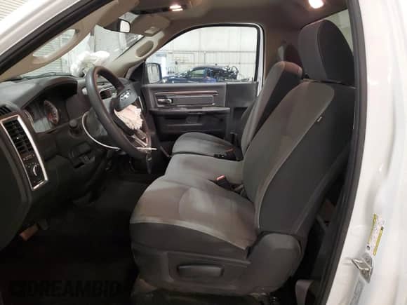 2023 Ram 1500 with VIN 3C6JR7EG8PG675357, listed as a Copart auction lot 60595825 with 33,043 mi miles and Salvage title. Bid and sale history available at DreamBid. Image 7.