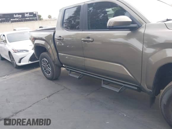 2024 Toyota Tacoma SR5 with VIN 3TMLB5JN1RM043397, listed as a IAAI auction lot 42181997 with 9,254 mi miles and . Bid and sale history available at DreamBid. Image 14.